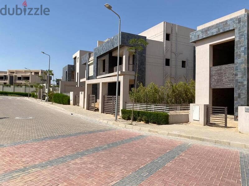 Villa for sale, 244 square meters, at the entrance to Sheikh Zayed, next to the Mall of Arabia, Karma Gates 1