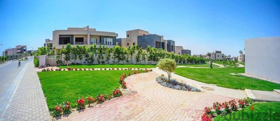 Villa for sale, 244 square meters, at the entrance to Sheikh Zayed, next to the Mall of Arabia, Karma Gates 7