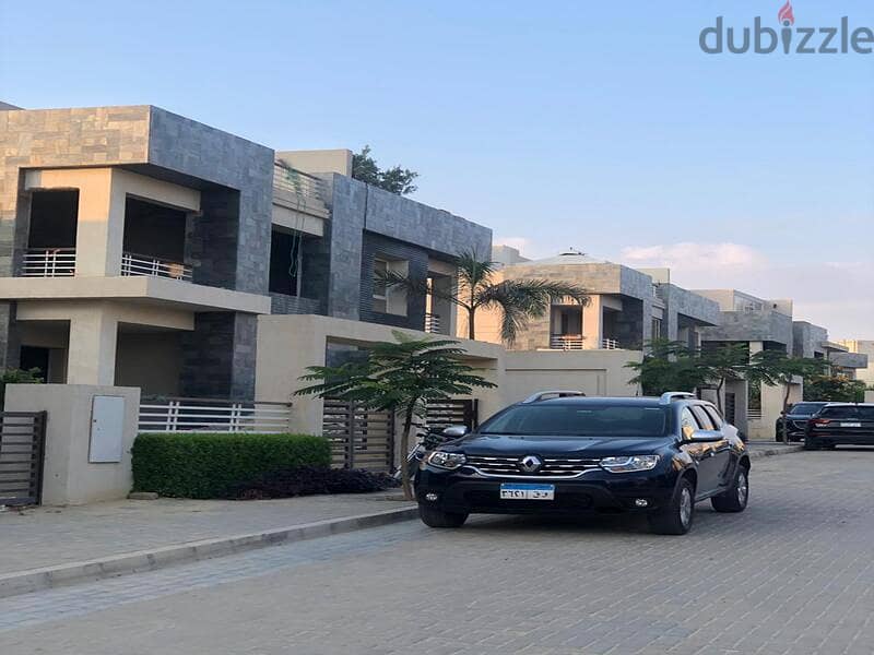 Villa for sale, 244 square meters, at the entrance to Sheikh Zayed, next to the Mall of Arabia, Karma Gates 11