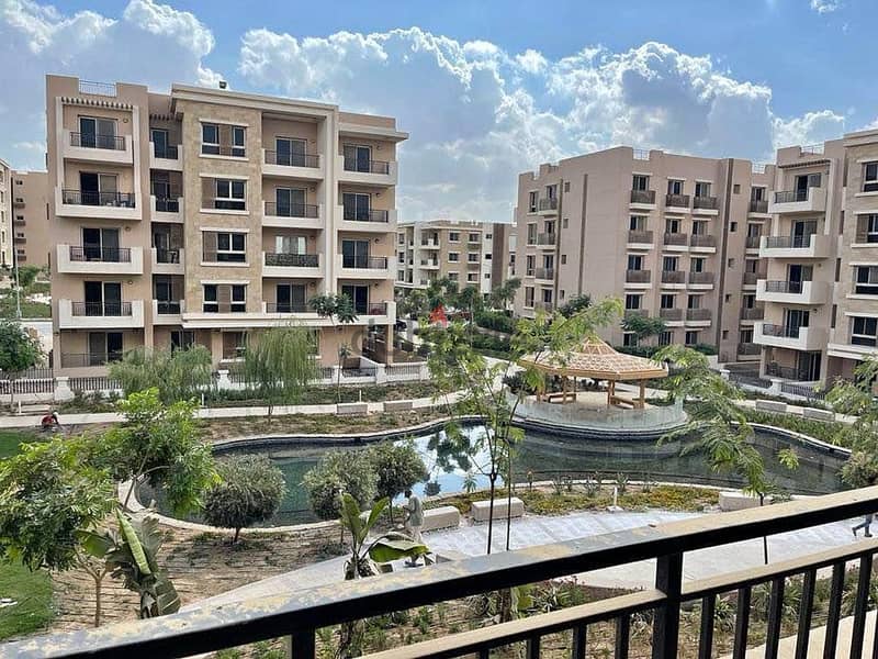 A luxury 137 m apartment for sale + Garden in installments in front of Cairo Airport in Taj City 1