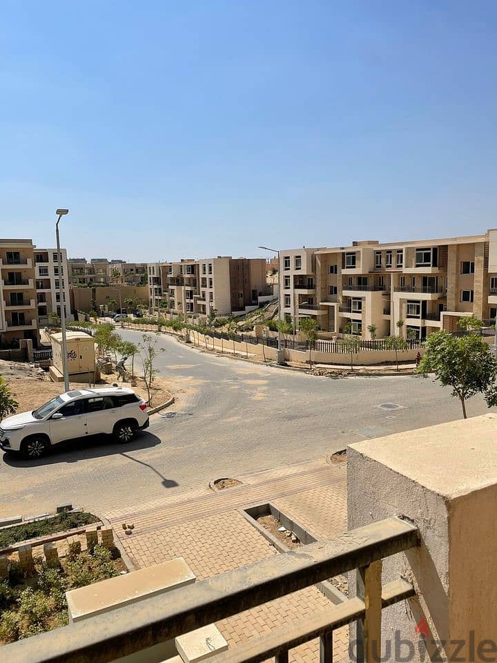 A luxury 137 m apartment for sale + Garden in installments in front of Cairo Airport in Taj City 3