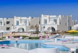 First row villa on the sea, prime location, panoramic view in Mountain View Sidi village at Al-Rahman