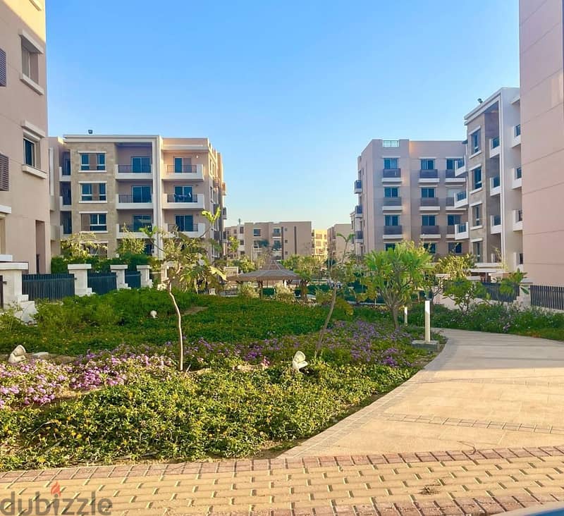 Ground floor apartment with a very special garden view for sale in Taj City Compound in front of Cairo International Airport near Heliopolis 3