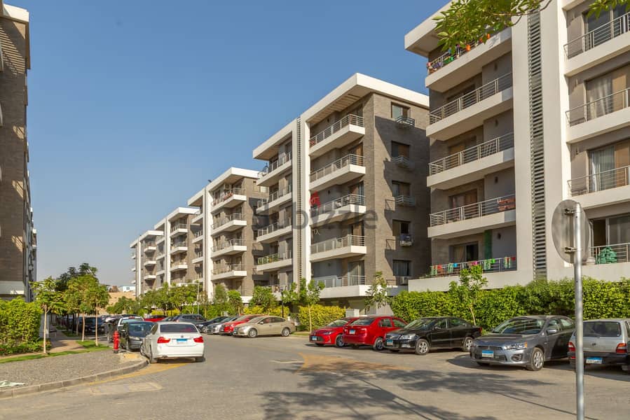 Ground floor apartment with a very special garden view for sale in Taj City Compound in front of Cairo International Airport near Heliopolis 6
