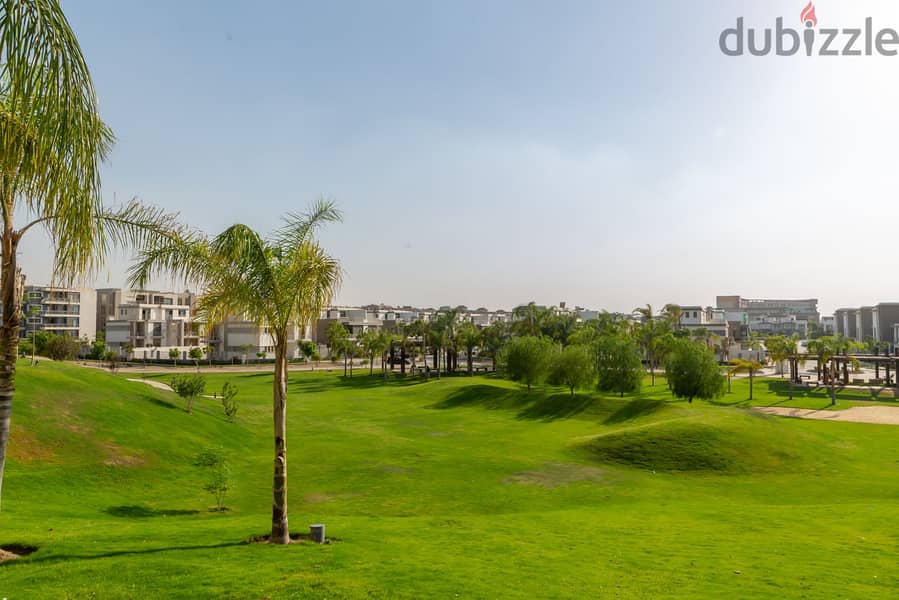 Ground floor apartment with garden for sale in Taj City Direct Compound on Suez Road in front of Kempinski Hotel 5