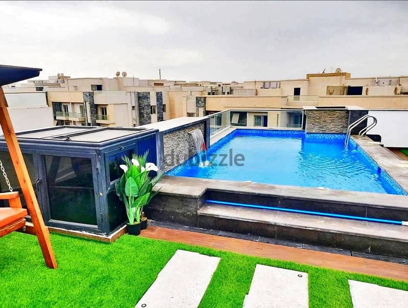 Next to Mivida, own a penthouse ready for inspection, 171 m, with a roof and a swimming pool, in New Cairo 3