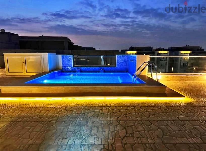 Next to Mivida, own a penthouse ready for inspection, 171 m, with a roof and a swimming pool, in New Cairo 4
