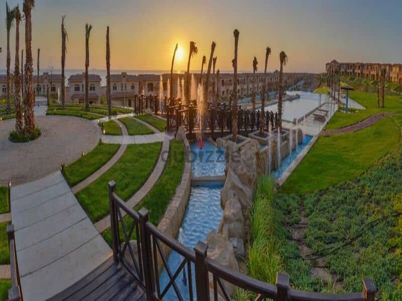 Sky chalet for sale, “3 rooms + maid’s room,” view lagoon in Telal Ain Sokhna village, next to Porto, fully finished, in installments 27