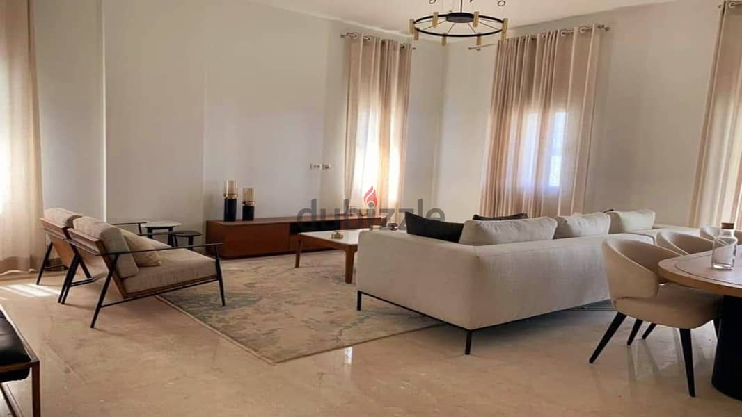 Apartment for sale in the heart of the community in Swan Lake Hassan Allam Compound, directly on Suez Road 4