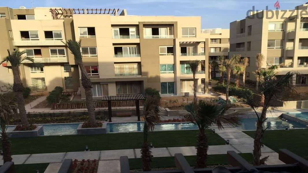 Apartment for sale in the heart of the community in Swan Lake Hassan Allam Compound, directly on Suez Road 9