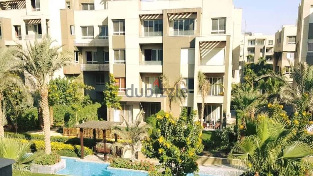 Apartment for sale in the heart of the community in Swan Lake Hassan Allam Compound, directly on Suez Road 7
