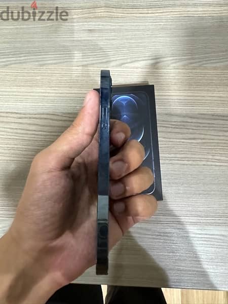 Iphone 12 pro blue in perfect condition - ايفون ١٢ برو ازرق بحالته 4