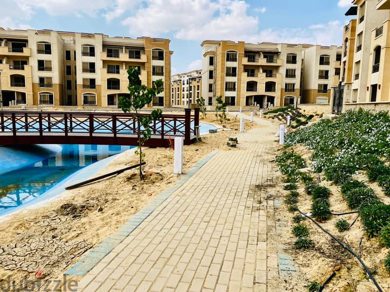 Apartment for sale stone residence compound new cairo ready to move with Garden in aliving Compound 4