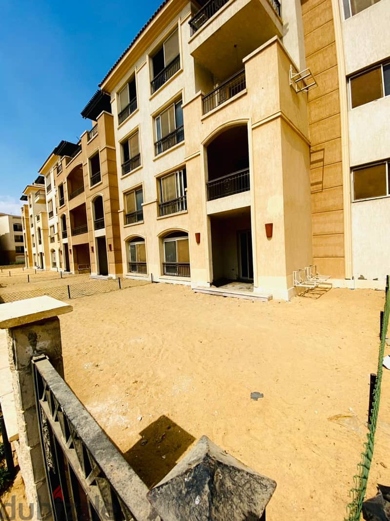 Apartment for sale stone residence compound new cairo ready to move with Garden in aliving Compound 8