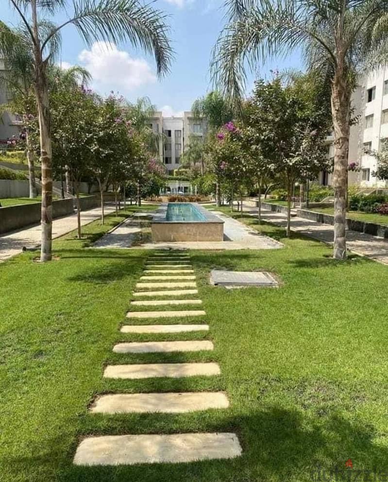 Own a two-bedroom apartment on the ground in the Galleria, Fifth Settlement 2