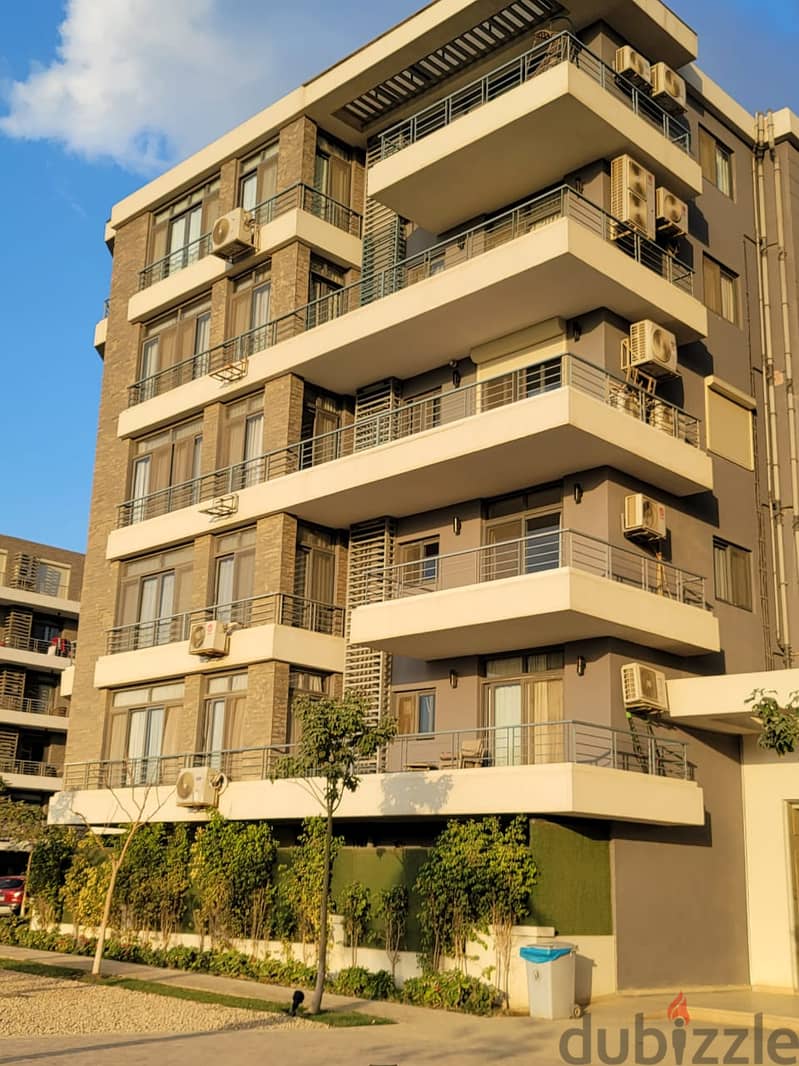 In Taj City Compound, an apartment for sale with a 10% down payment and interest-free installments over 8 years, view directly on the airport. 2
