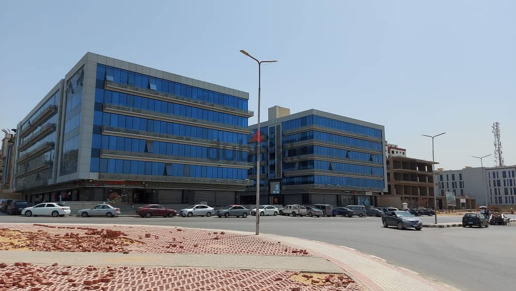 A store directly on the front of the mall for sale in Nasr City, next to Mostafa Al-Nahhas Street and Al-Ahly Club, immediate delivery and installment 1
