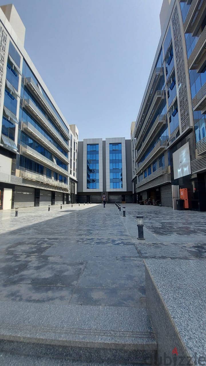 A store directly on the front of the mall for sale in Nasr City, next to Mostafa Al-Nahhas Street and Al-Ahly Club, immediate delivery and installment 2