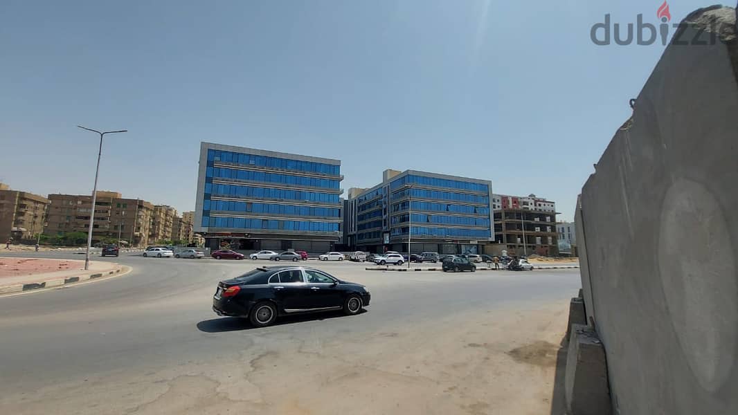 A store directly on the front of the mall for sale in Nasr City, next to Mostafa Al-Nahhas Street and Al-Ahly Club, immediate delivery and installment 9