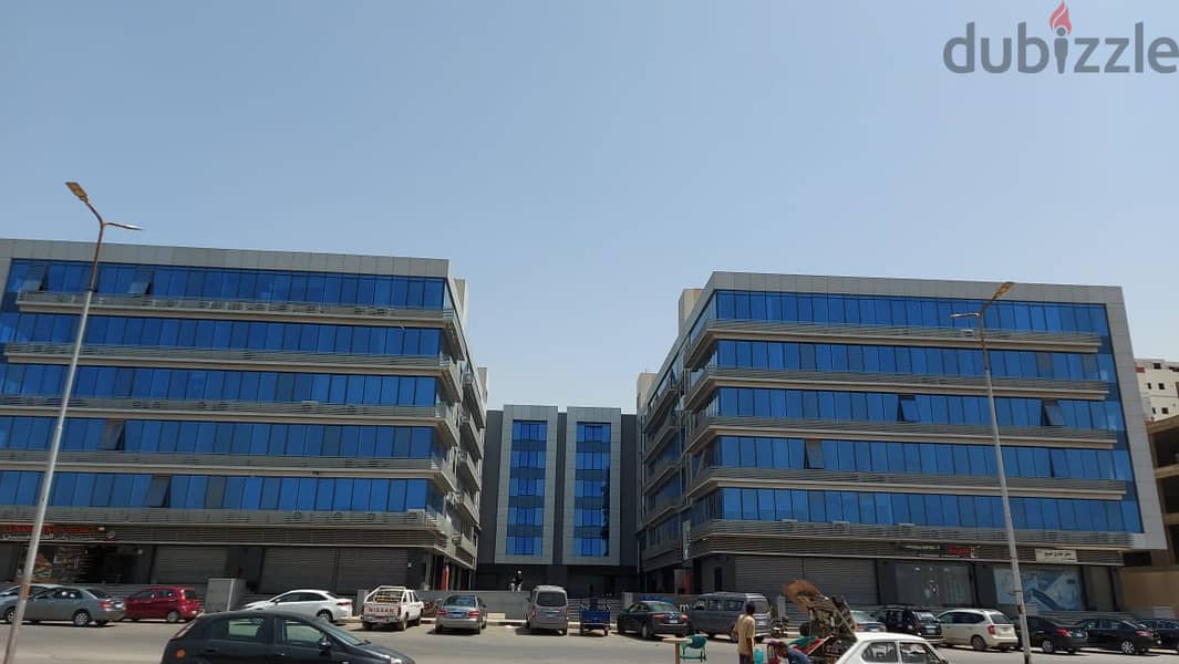 A store directly on the front of the mall for sale in Nasr City, next to Mostafa Al-Nahhas Street and Al-Ahly Club, immediate delivery and installment 11