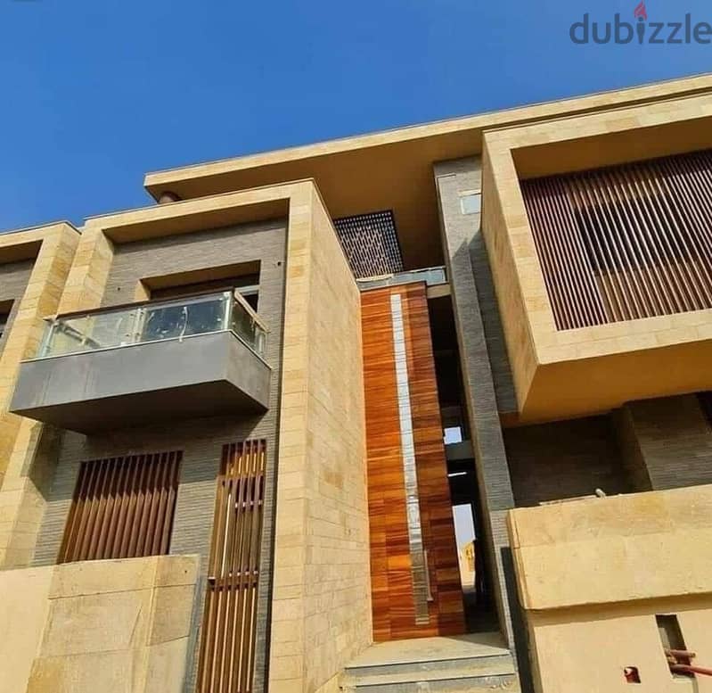 Villa for sale in Taj City Compound, First Settlement  The villa is 165 sqm with a garden of 45 sqm 8