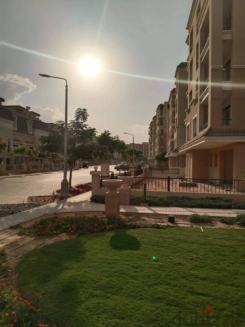 For sale, a 73 sqm studio with a 60 sqm garden, a distinctive division on a landscaped view, in Sarai Compound, New Cairo, with a down payment of 450 19