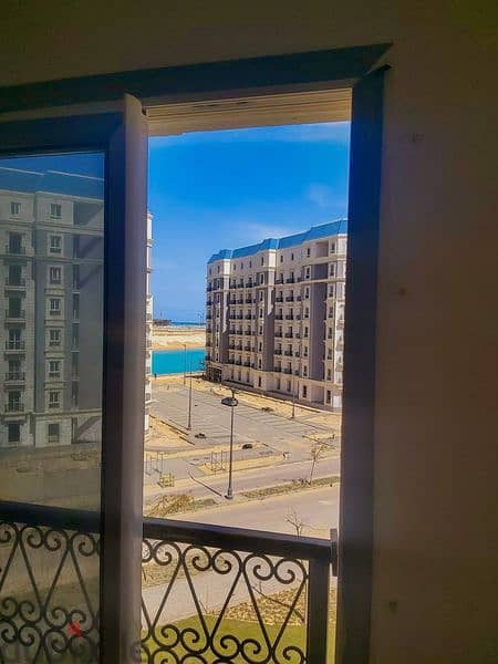 Fully finished apartment with clear sea view, 166 meters, ready for inspection and receipt in the Latin Quarter, New Alamein, in installments over 10 8