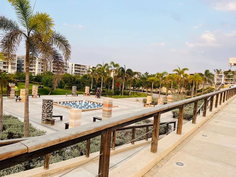 For sale, a 137 sqm apartment with a 100 sqm garden, with a fantastic view on the landscape, in Taj City, New Cairo. 4