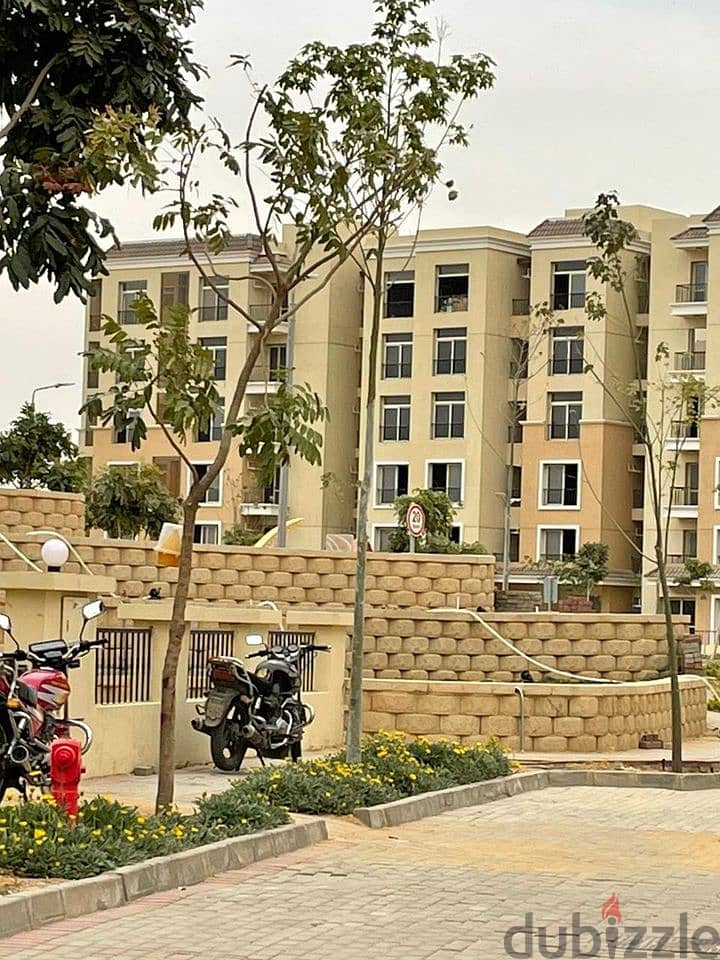 Apartment 130m with garden next to Madinaty in Sarai Compound للبيع شقه ارضي بجاردن علي طريق السويس بجوار مدينتي في كمبوند سراي 3