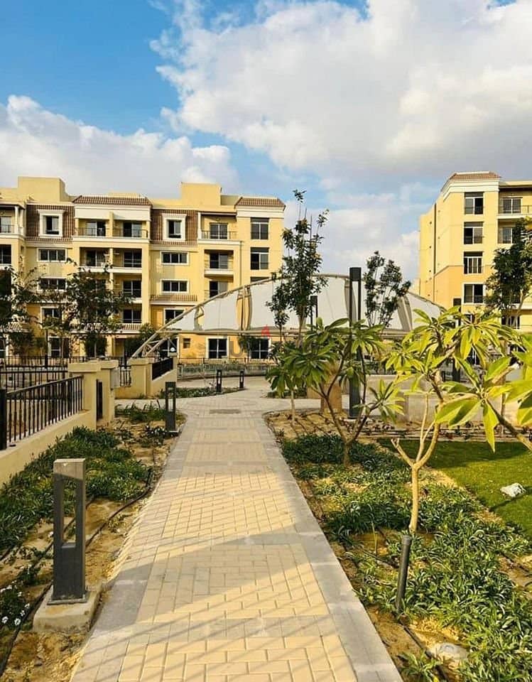Apartment 130m with garden next to Madinaty in Sarai Compound للبيع شقه ارضي بجاردن علي طريق السويس بجوار مدينتي في كمبوند سراي 4