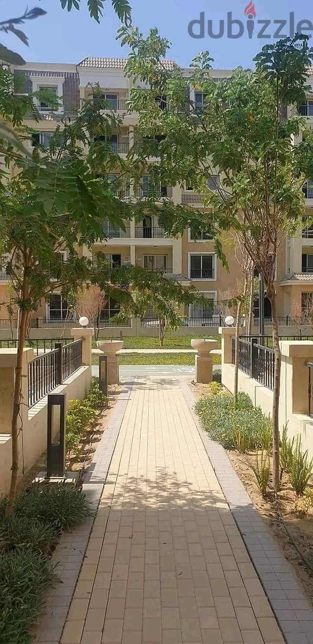 Apartment 130m with garden next to Madinaty in Sarai Compound للبيع شقه ارضي بجاردن علي طريق السويس بجوار مدينتي في كمبوند سراي 8