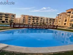 Amazing ground apartment at Stone Residence New Cairo 128m for sale