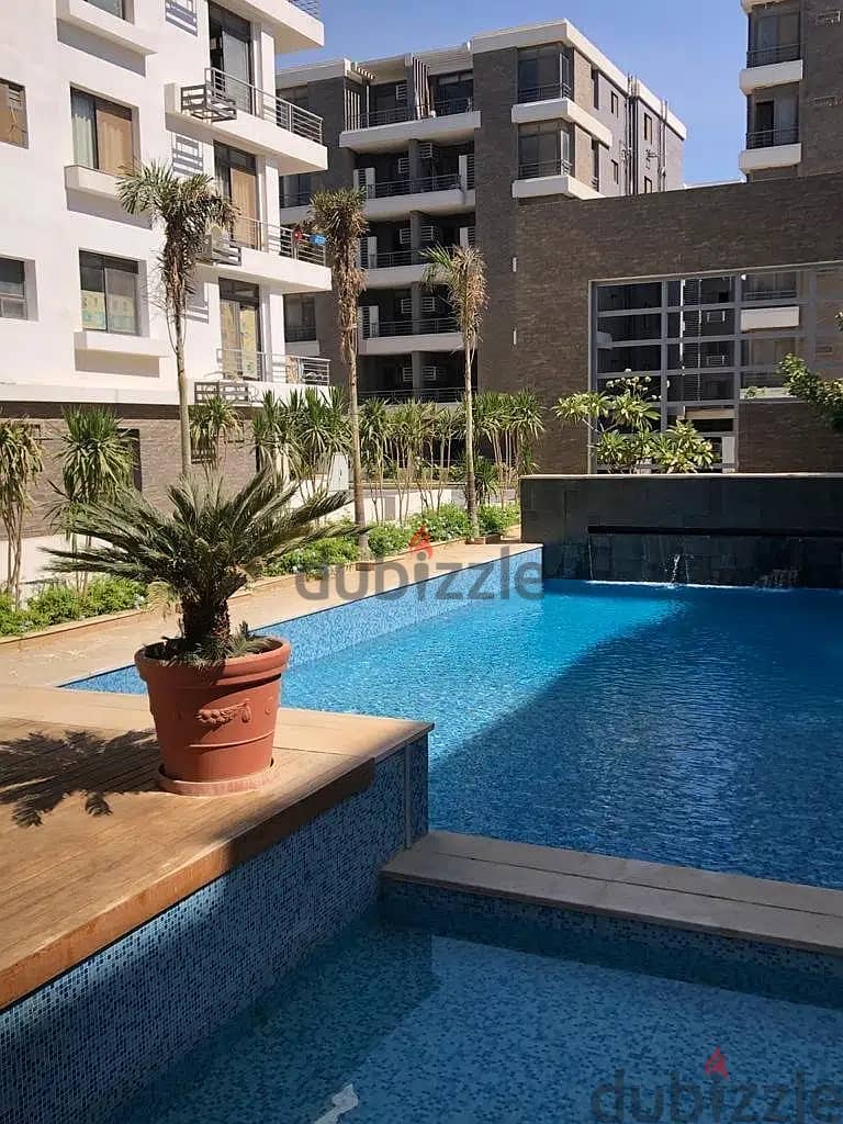 Duplex apartment with garden for sale in Taj City New Cairo, in front of Cairo International Airport (4 rooms) with a 39% discount on cash and install 8