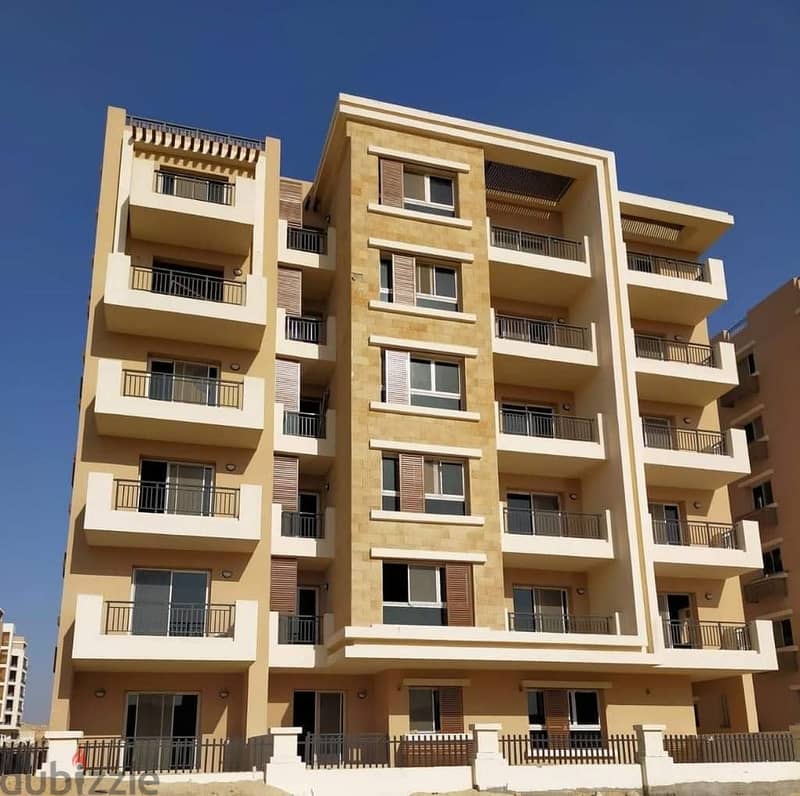 Own your 70-square-meter apartment with a garden in the heart of New Cairo in Taj City Compound near the German University with a 5% down payment 7