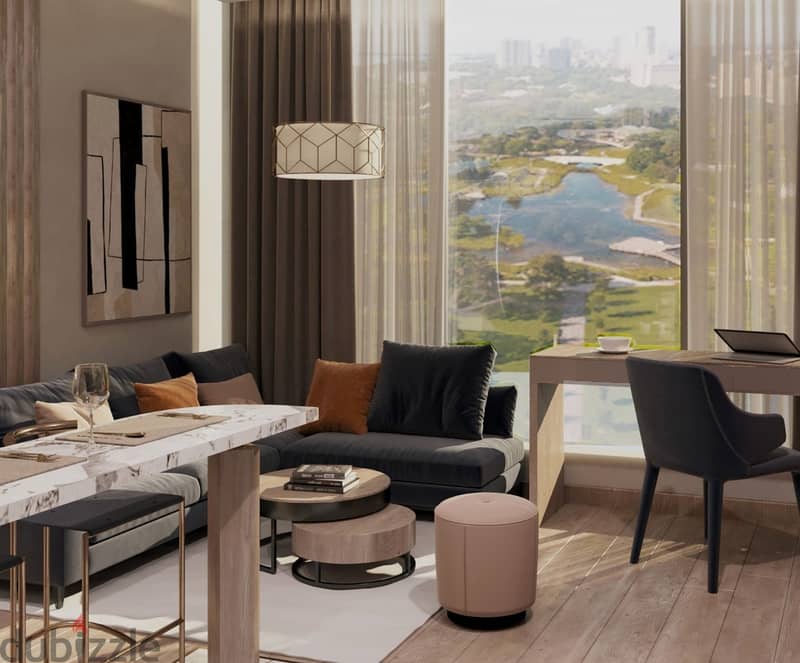Guaranteed investment, finished hotel room, partnership with the developer, with a 10% down payment and 10-year installments, in front of the Internat 10