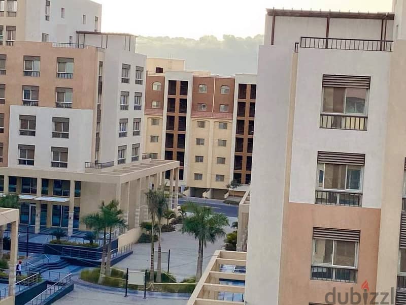 Apartment 149 sqm ready to move finished with kitchen and air conditioners in Al-Maqsad the new capital next to Madinaty and close to the new cairo 8