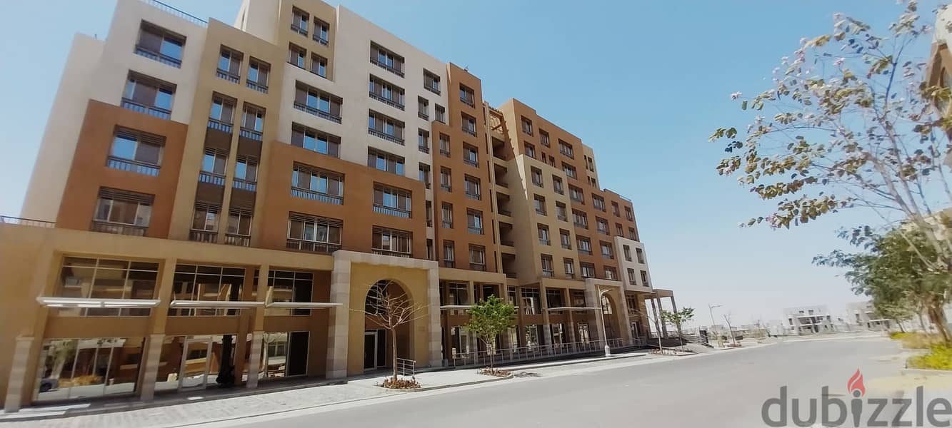 Apartment 144 sqm ready to move finished with kitchen and air conditioners in Al-Maqsad the new capital next to Madinaty and close to the new cairo 1