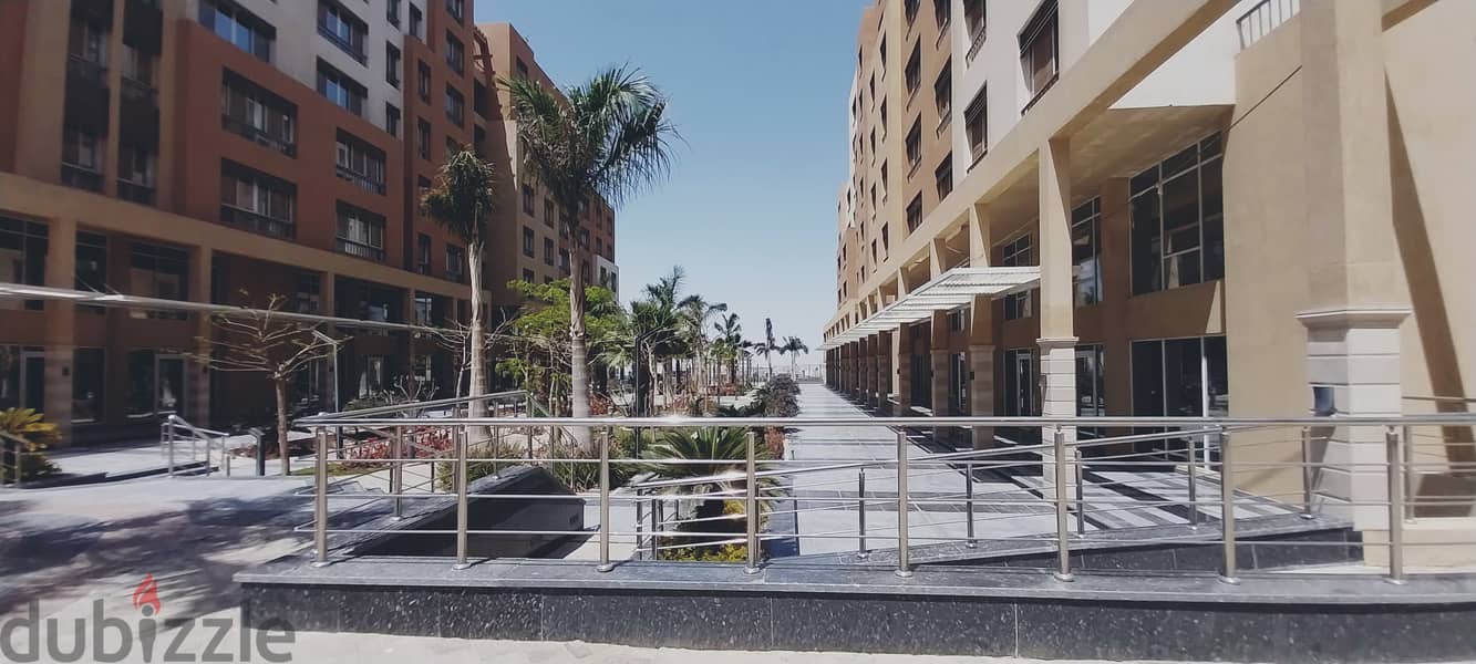 Apartment 144 sqm ready to move finished with kitchen and air conditioners in Al-Maqsad the new capital next to Madinaty and close to the new cairo 2