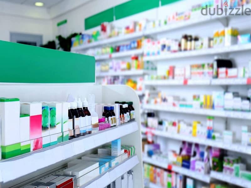 A pharmacy with a 30% discount in a medical building that serves 60 clinics and a radiology center in front of the entrance to Abdul Qader Fahmy Hospi 5