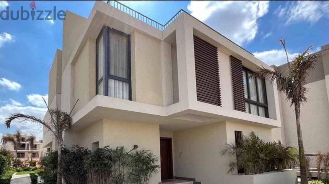 Villa for sale in the heart of the Fifth Settlement in New Cairo, next to the American University on the 90th Street In installments over 8 years 1