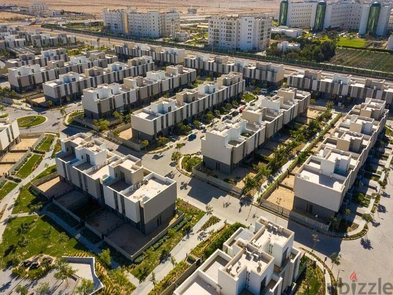 Find the price of a townhouse villa with a 5% down payment and equal installments in Al Burouj 20