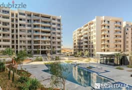 Apartment for sale - (Il Bosco Compound)_by Misr Italia Company in the Administrative Capital - area 114 meters - ground floor + garden 39 meters