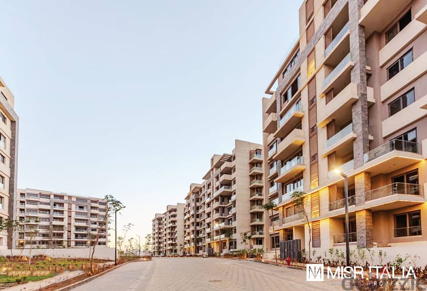 Apartment for sale - (Il Bosco Compound)_by Misr Italia Company in the Administrative Capital - area 114 meters - ground floor + garden 39 meters 8