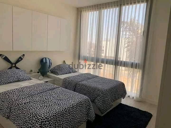 Finished apartment with a distinctive view in the Vye Sodic Compound, Sheikh Zayed, on the Dabaa axis, next to Solana, SODIC VYE, with a 10% discount. 3
