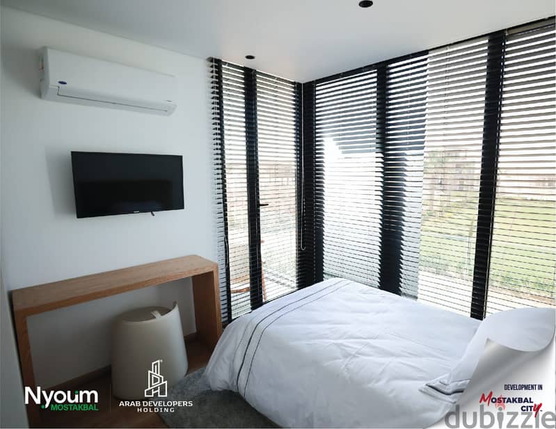 At the best price, own a two-bedroom apartment in Nyoum Compound, Mostakbal City 2