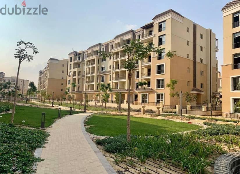 For sale, two-bedroom apartment with a 220 sqm garden, in installments over 8 years, in New Cairo 3