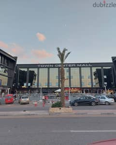 Shop for sale, 130 sqm, immediate receipt, ground floor in the most famous mall in Shorouk, in front of Green Hills Club and next to the gate of Dar M 0