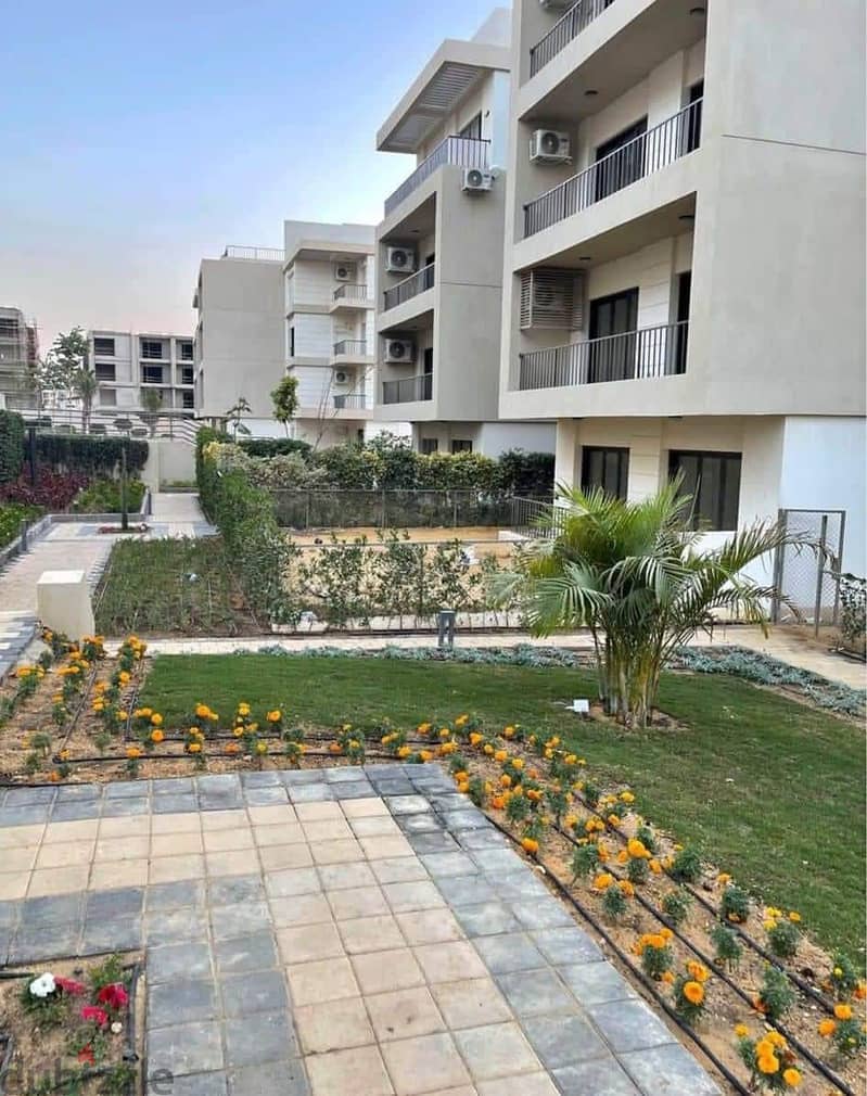 Apartment with garden (immediate receipt + finished) for sale in the Fifth Settlement, Al Marasem Fifth Square Compound 1