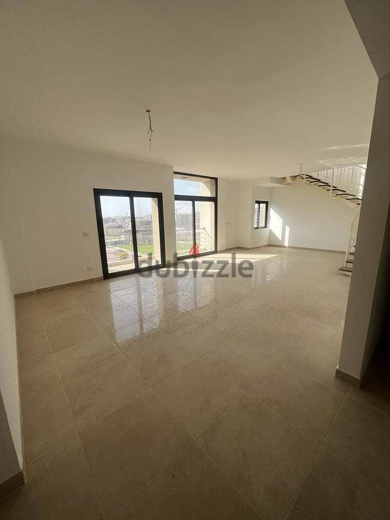 Apartment with garden (immediate receipt + finished) for sale in the Fifth Settlement, Al Marasem Fifth Square Compound 3