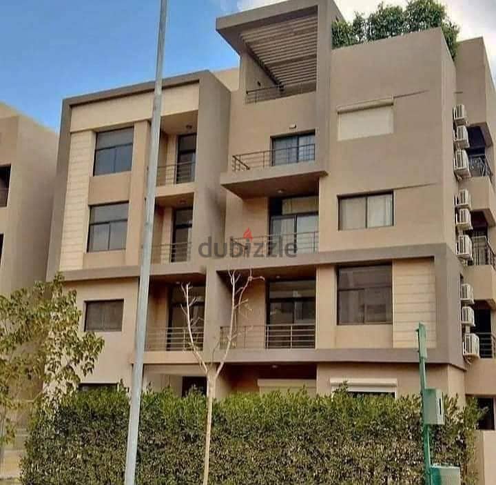 Apartment with garden (immediate receipt + finished) for sale in the Fifth Settlement, Al Marasem Fifth Square Compound 6